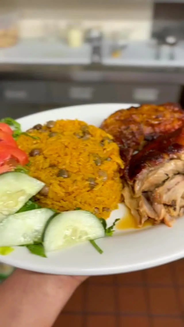 Moro with pigeon peas and pernil plate